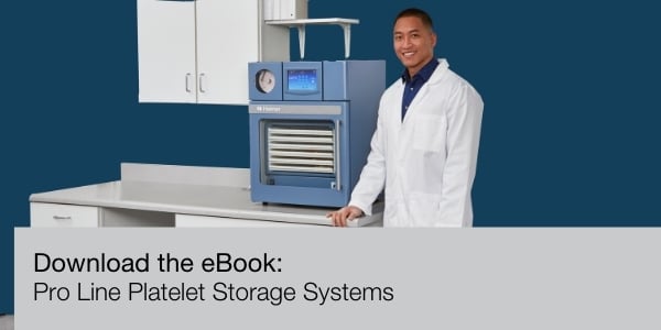 A blood bank worker with Helmer Scientific's Pro Line Platelet Storage Systems